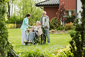 husband and carer taking care of woman