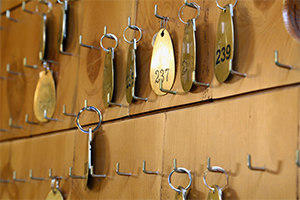 key tags hanging on a wall